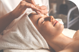 photo of a woman having facial