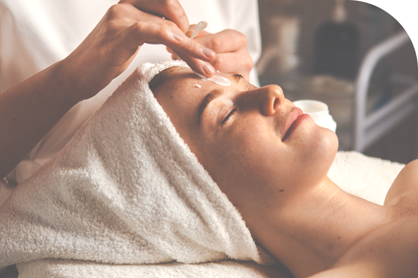 photo of a woman having facial